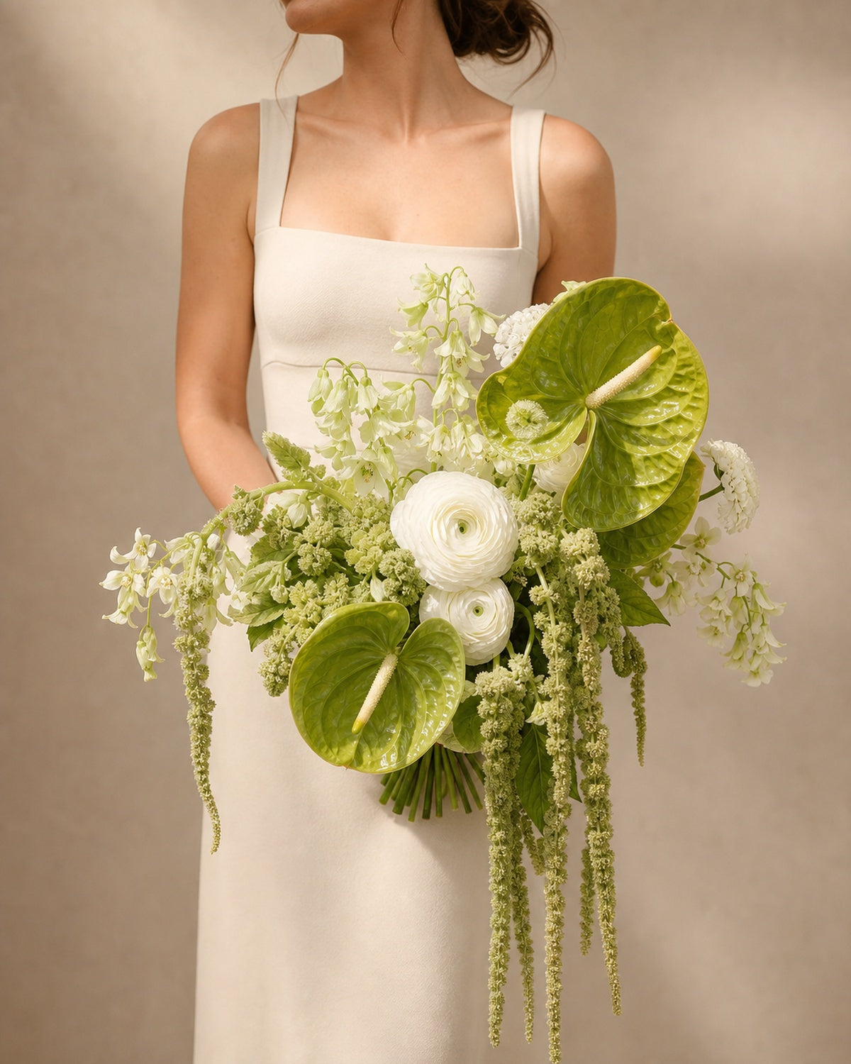 Modern wedding bouquet with green and white flowers